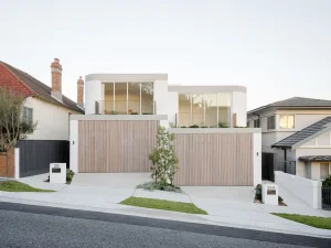 Pamment Projects Coogee Duplex Front Facade Timber Batten Garage Doors Concrete Driveway